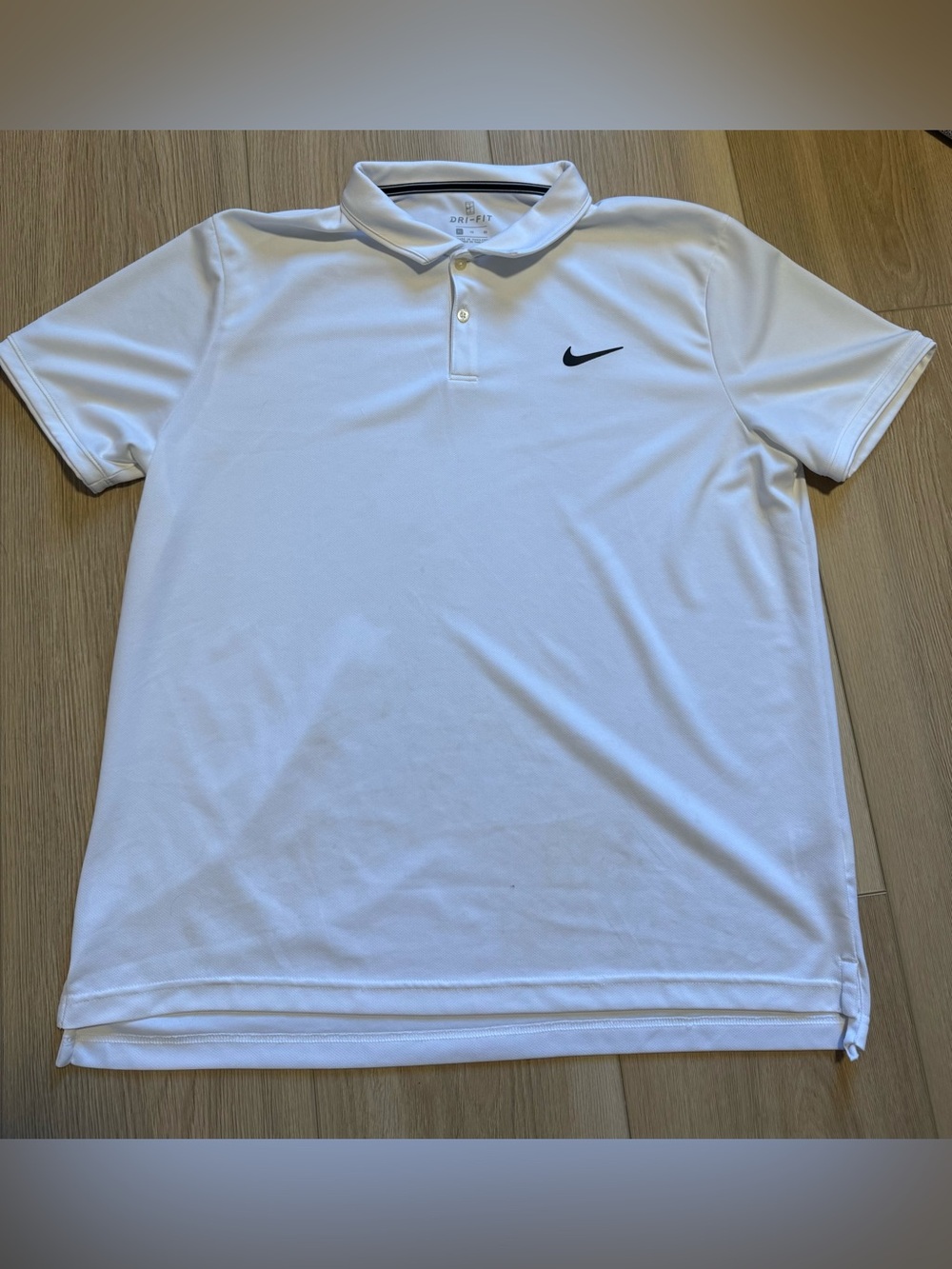 Nike White Polo Shirt with Black Swoosh